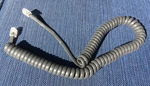 6 foot coiled telephone cord - dark gray - unused - Picture 1 of 4