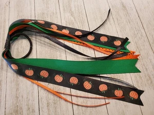 Soporte de cola de caballo con cinta de calabaza de Halloween Streamer - Imagen 1 de 1