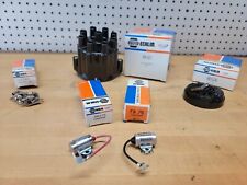 Echlin Ignition Parts. Distributer cap, Rotor, contact set, and condensers
