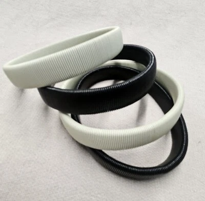 Brazalete con soporte para camisa ligas de metal antideslizante unisex negro blanco  Foto 1 de 4
