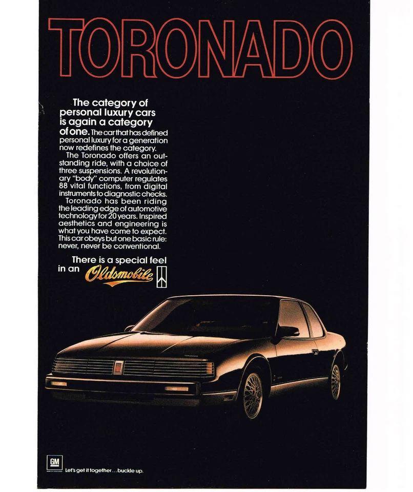 1986 Oldsmobile TORONADO Black 2-door Vintage Print Ad - Image 1 of 1