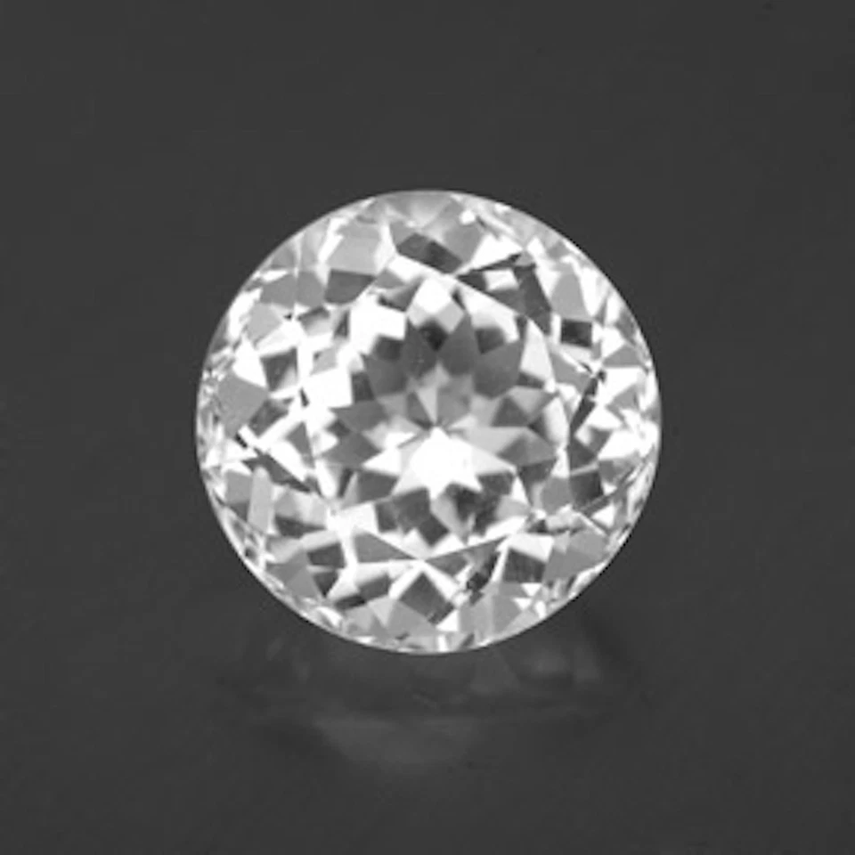 Gemas sueltas facetadas redondas AAA de topacio blanco brillante natural genuino (1 mm- 12 mm) Foto 1 de 1