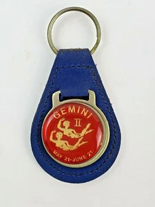 Vintage Gemini II leather keychain keyring metal back Blue w Red Face - Picture 1 of 4