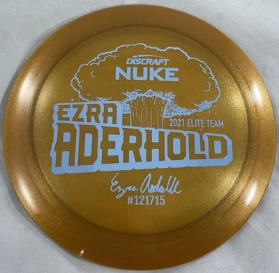 Discraft Z Metallic Nuke Dist Drvr, Ezra Aderhold 2021 Elite Team, 173-174g, New - Image 1 of 2