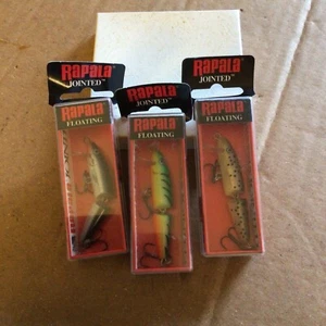 Lote de 3 señuelos de pececillos flotantes articulados Rapala J-5, plateados, bomberos, trucha marrón - Imagen 1 de 4