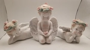 Vintage 3er Set Engel Cherub Figuren Porzellan Amor sitzend liegend Rosen - Bild 1 von 17
