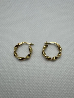 Beautiful 14K Yellow Gold Plated Twisted Round Hoop Earrings Clip On Closure - Image 1 of 4