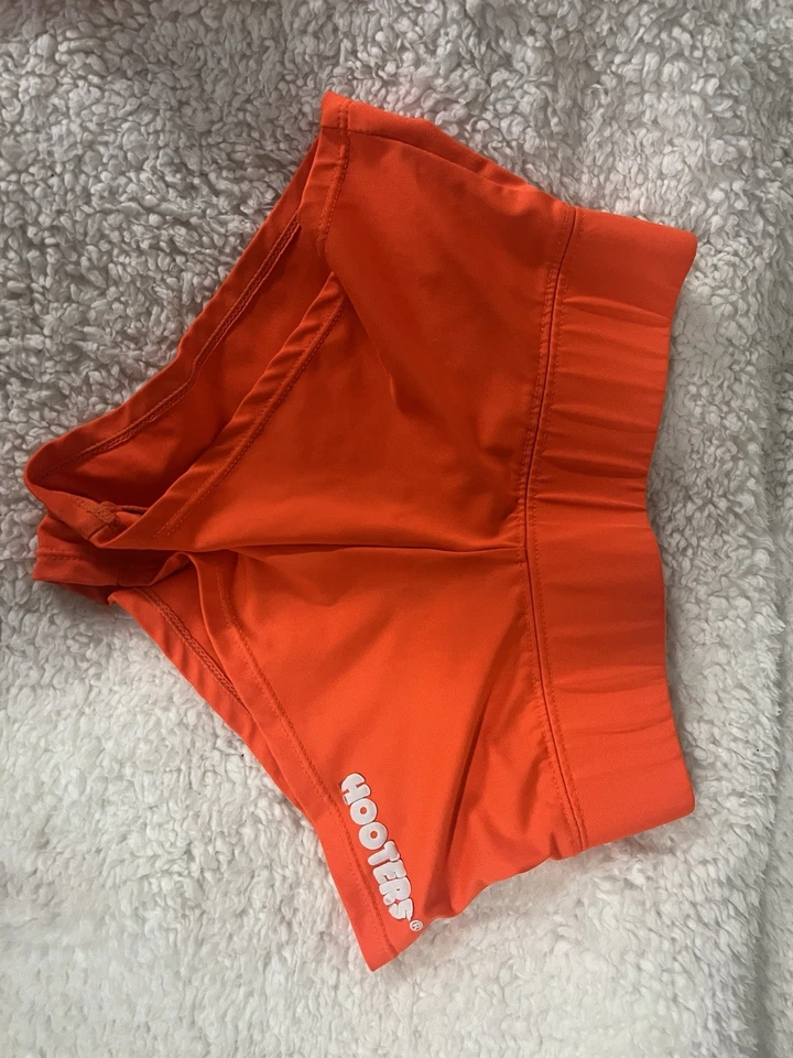 Pantalones cortos para mujer Hooters auténticos uniformes naranja Foto 1 de 1