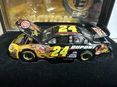 2004 Action RCCA Elite 1/64 Jeff Gordon DuPont The Wizard of Oz Monte Carlo - Image 1 of 4