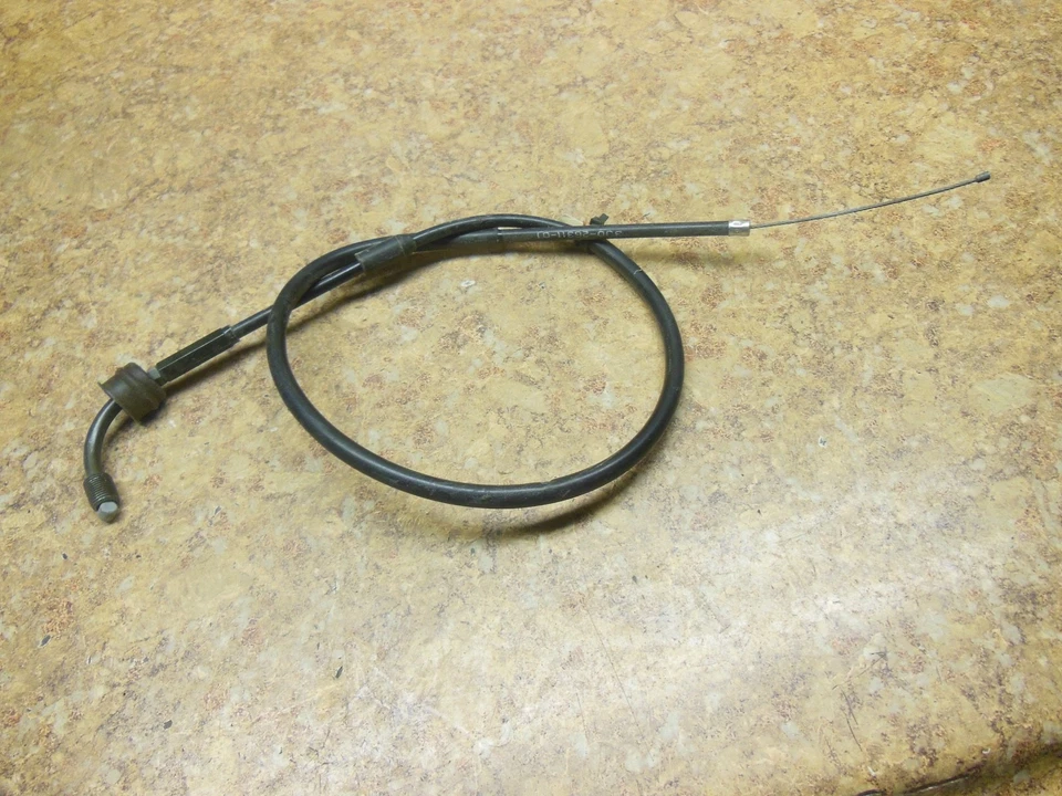 Cable acelerador de vinilo negro Yamaha OEM NOS DT175 DT 175 3J0-26311-01 DT175 DT 175 Foto 1 de 2