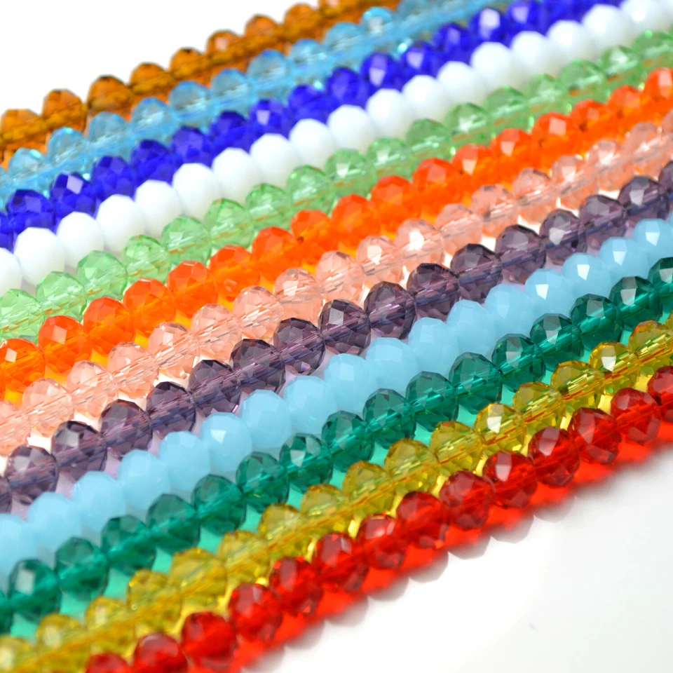 FACETED RONDELLE CRYSTAL GLASS BEADS PICK COLOUR 4X3MM,6X4MM,8X6MM,10X8MM - Image 1 of 1
