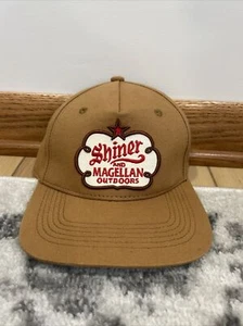 Magallanes Exterior y Brillante Cachilete Bronceado Sombrero Banda Ajustable Gorra Totalmente Nuevo - Imagen 1 de 2