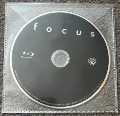 NEW FOCUS (2015) - Blu-ray disc only in clear plastic envelope / no case - Image 1 of 3