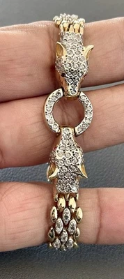 14KT Y/W Gold 1.60CTW Diamond & 0.04CTW Ruby Panther Bracelet. 6.25 inches(X313) - Image 1 of 4