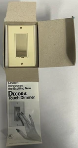 UNUSED Leviton 6606-I Decora Touch Dimmer Ivory Frame Gold Plate One Pole (A6) - Picture 1 of 7