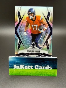 2025 Panini Phoenix NFL - Devaughn Vele #14 Silver Holo - Denver Broncos - Picture 1 of 2
