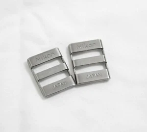 VINTAGE PAIR OF NIKON 3/4 INCH METAL CAMERA STRAP HOLDERS - Picture 1 of 2