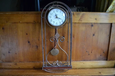 Melinda Quartz Wall Clock with Pendulum - Howard Mille Measures 22 1/4 X 9 1/2". - Image 1 of 4