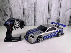 Fast & Furious 1:10 RC Drift Car Brian's Nissan Skyline GT-R R34 scala 1/10 Jada - Foto 1 di 10