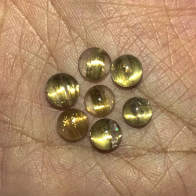 8.44cts 6.5mm Round 7Pieces Sharp Line Natural Rutilated Quartz Catseye Gemstone - Image 1 of 3