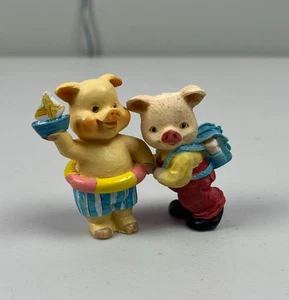 2 VINTAGE BEACH HIKER HOG PIG IN BIKINI PIGGY BACKPACK FIGURE FIGURINES - Picture 1 of 4