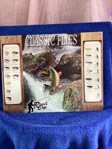 Letrero retro de metal de hojalata Mowery River’s Edge Classic Flies # 1296 Desperate Enterp. - Imagen 1 de 11