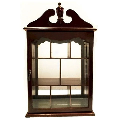 Vintage curio cabinet.  Colonial.  Mahogany stained, glass door.  Mirror backed Cover