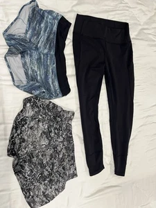 Lululemon Women 2 Pairs of shorts and 1 Leggings unknown size no Tags used - Picture 1 of 2
