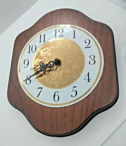 Bulova Wood Framed Cosmos Quartz Wall Hanging Clock 10 1/2" x 9" Cover