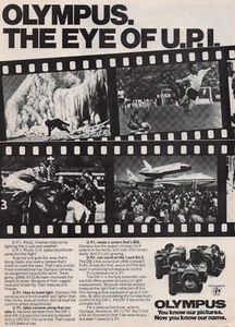 1979 Vintage Print Ad Olympus The Eye of U.P.I. SLR OM-1 OM-2 reist gerne - Bild 1 von 2