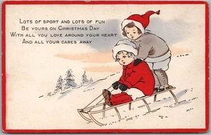 Whitney CHRISTMAS Postcard Boy & Girl on Snow Sled "Lots of Sport & Lots of Fun" - Picture 1 of 2