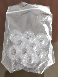 Janome Plastic Bobbins Set of 10 - Picture 1 of 1