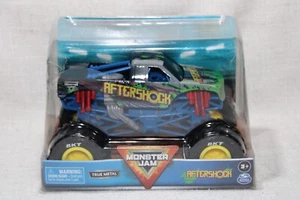 Monster Jam anno 2021 scala 1:24 metallo pressofuso serie ufficiale camion AFTERSHOCK - Foto 1 di 9