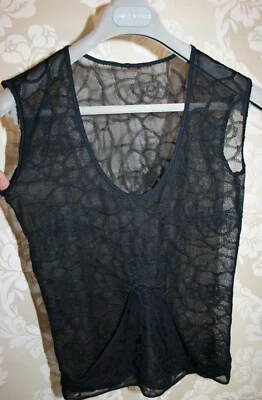 Camiseta sin mangas/chaleco Chanel vintage años 90 camelias malla semi transparente tejido elástico negro. Foto 1 de 4
