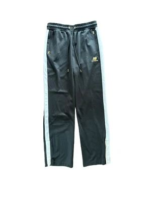 Pantalones deportivos New Balance Pod negros blancos a rayas y dorados cintura elástica nuevos con etiquetas Foto 1 de 4