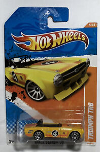 Hot Wheels 2011 Track Stars Series #70 Triumph TR6 Yellow w/ 10SPs