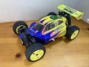 Kyosho Mini Inferno Electric 4WD Micro (Blue/Yellow) - Picture 1 of 5