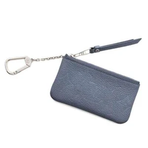 Pochette Louis Vuitton Cles Monogram Empreinte pelle blu metallizzato M80900 - Foto 1 di 9