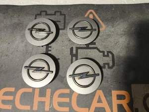 4 Tapas centrales llanta GM/Opel – refs. 93358015 / 13214658 - Imagen 1 de 4