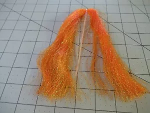 KRYSTAL FLASH FLY TYING LURE MAKING MATERIAL CRYSTAL FLASH SPLASH HOT ORANGE - Picture 1 of 3