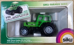 Siku 3154 Trattore Deutz-Traktor DX 6.31 Turbo ruote post. gemellate 1:32 - Foto 1 di 3