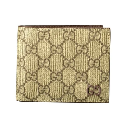 Cartera plegable Gucci para hombre de cuero marrón interior estampado GG Foto 1 de 4