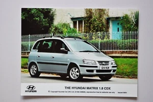 Foto stampa auto - Hyundai Matrix 1.8 CDX 2001 - bianco - vista anteriore/laterale - Foto 1 di 1