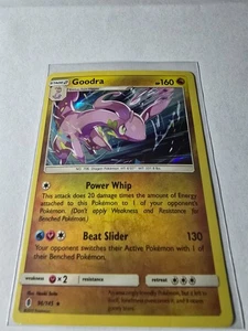 Goodra Holofoil Holo Rare SM - Guardians Rising 96/145 NM - Picture 1 of 1