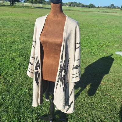 SUÉTER ACRÍLICO FRENTE ABIERTO TALLA 0 VOLANTES TALLA 0S  Foto 1 de 4