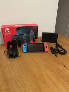 Nintendo Switch Console + Dock 128GB Charger Joycon Grip Neon Red Blue (HAC-001) - Picture 1 of 18