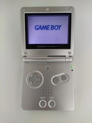 Nintendo Gameboy Advance SP Platinum/Silver Console  CIB + Leather Case. - Image 1 of 4