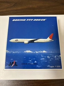 Japan Airlines B777300ER model 1/500 with stand, used, some paint wear - Picture 1 of 4