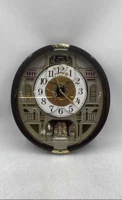 Seiko Brown Melodies In Motion Musical Rotating Dial Quartz Wall Clock - Image 1 of 4