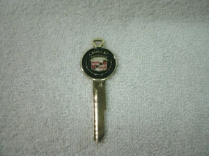 Vintage Cadillac Gold /Black Key Colored Crest-- --NEW/UNUSED/UNCUT - Picture 1 of 3